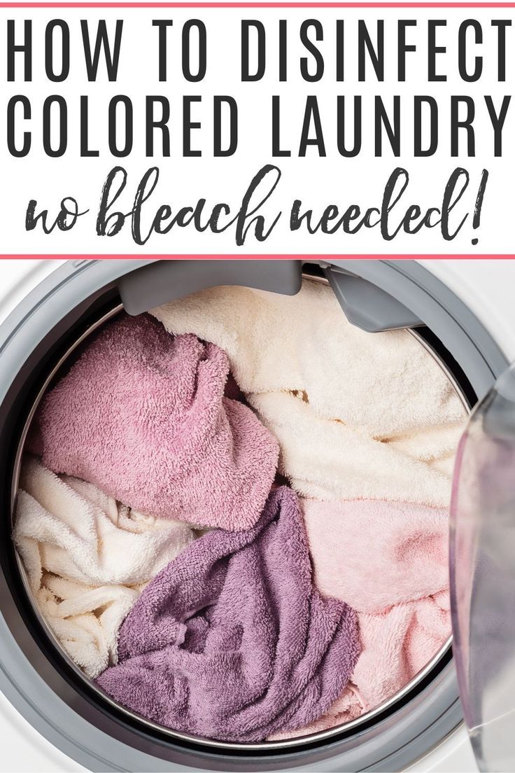 a washing machine with towels in it and the words how to disinfect colored laundry no bleach needed