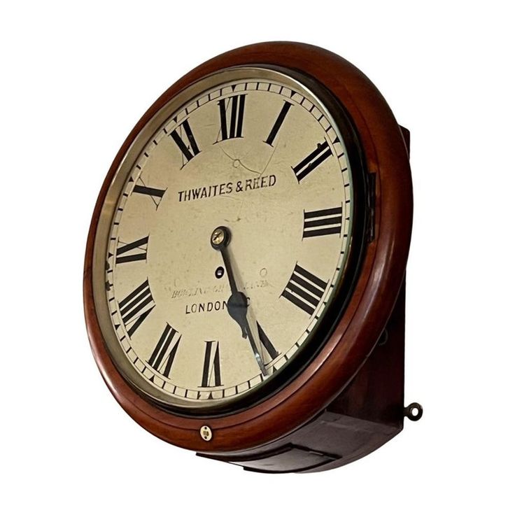 an old fashioned clock with roman numerals on the face is shown against a white background