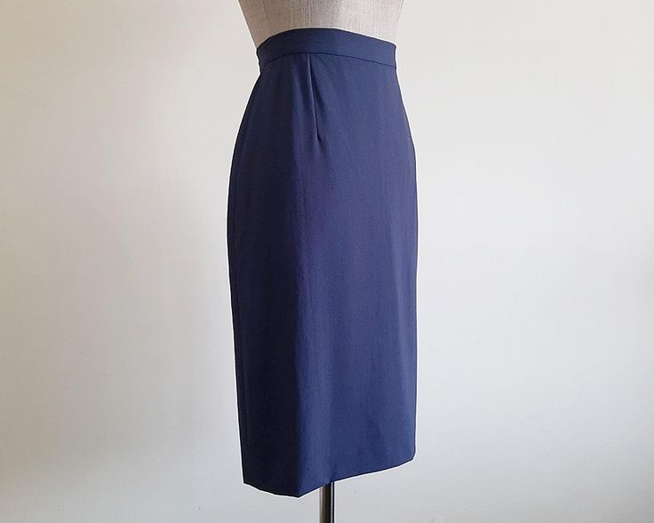 Vintage Navy Blue Straight Skirt - Label : MISSONI DONNA  - Fabric : 50% wool 50% viscose  - Nylon zipper on the back - Lined - Made in Italy - Very good vintage condition Measurements :  Waist : 27" Hips : 39" Total length : 24.5"  Our products are vintage clothing that will be cleaned so you can be confident in the quality. We carefully inspect each garment to make sure that you get the most accurate and informed description possible. We do our best to state any imperfections in the listing. If a flaw accidentally escapes our inspection, please let me know as soon as possible and we will be happy to help remedy the situation. Please read the product description carefully before purchasing to ensure it meets your needs. If you have any questions, please feel free to contact us. Thank you Classic Blue Mini Skirt, Navy Fitted Mini Skirt, Fitted Navy Mini Skirt, High-waist Blue Relaxed Skirt, Blue High Waist Relaxed Skirt, Blue Knee-length Pencil Skirt For Summer, Classic Navy Lined Skirt, Spring Formal Blue Pencil Skirt, Blue Midi Pencil Skirt For Summer