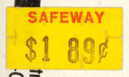 a yellow sign with the words safeway written in red and black on white paper