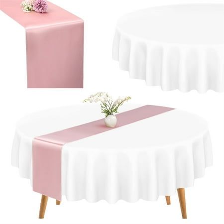 two tables with pink and white tablecloths on them, one has flowers in a vase