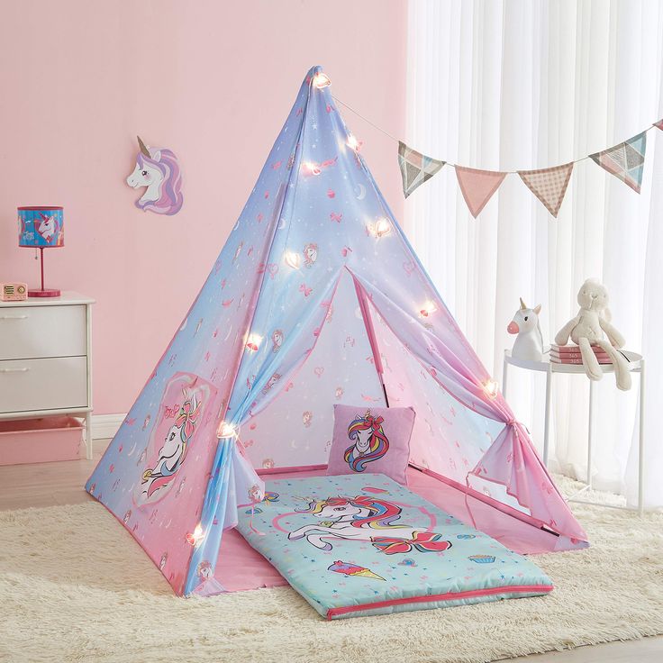 PRICES MAY VARY. ORIGINAL JOJO SIWA DESIGN: Each piece in this set features fun and bright iconic JoJo Siwa images and graphics. 4 PIECE SET INCLUDES: This complete slumber part set includes Tee Pee Play Tent, Sleeping Bag, Dec Pillow and String Lights MULTI PURPOSE USE: Kids will love each piece of this set and can use these as stand alone to bring on the go or all together for a fun sleepover party. PRODUCT DIMENSIONS: Sleeping bag is 46"x26" and has zip around closure, Pillow is 12"x12", Tent Jojo Siwa Bedroom Ideas, Canvas Teepee, Sleepover Tents, Teepee Play Tent, Dec Pillows, Unicorn Pillow, Bag Pillow, Bed Tent, Teepee Tent