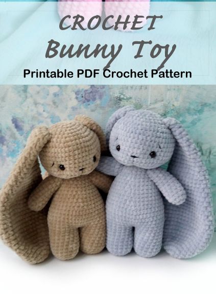 two crochet bunny toys sitting next to each other on a blue and white background