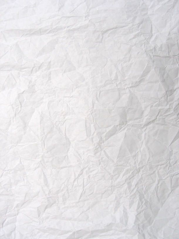 a white sheet of paper that has been wrinkled