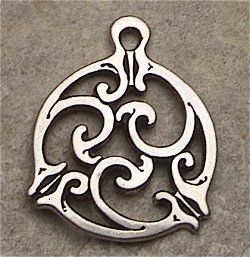 a metal ornament with swirls on it