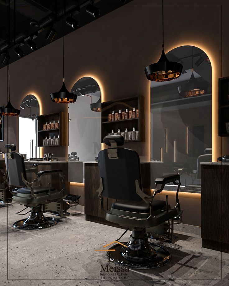 the interior of a hair salon with mirrors and lights on the wall, chairs in front of them