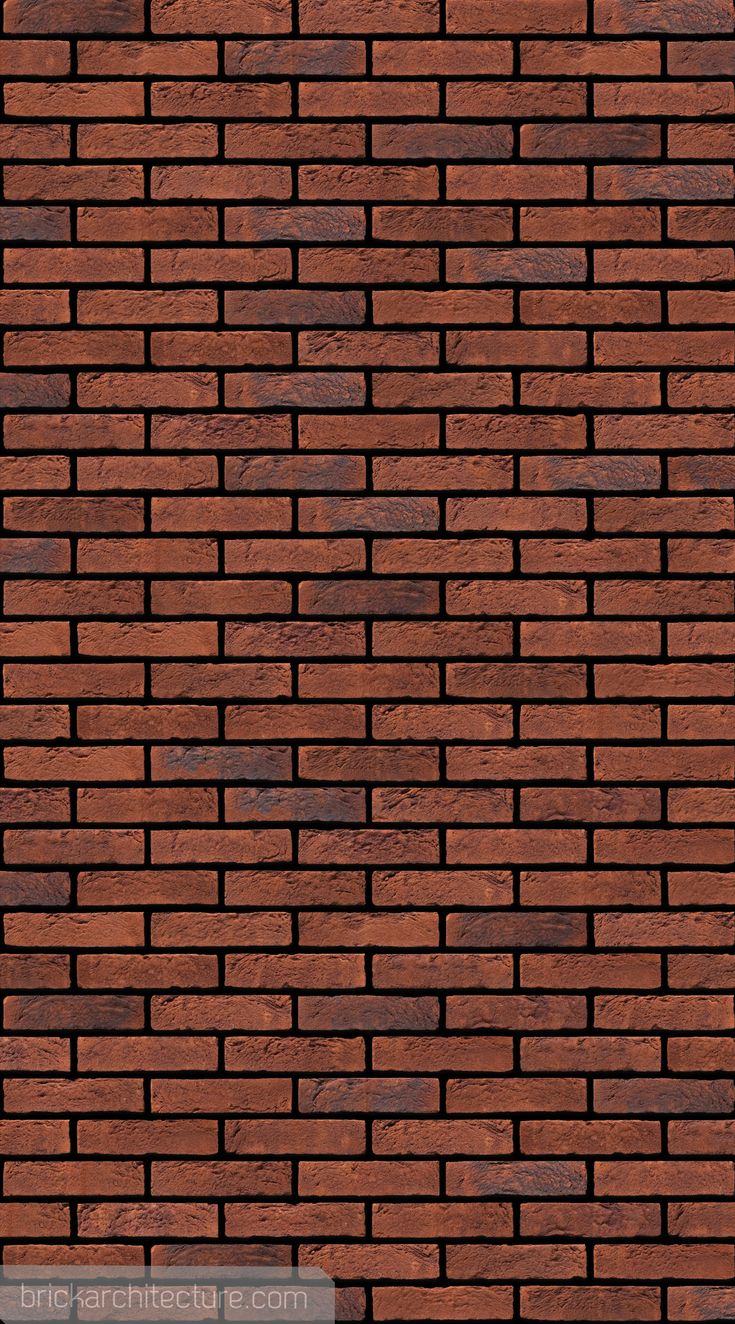 a brick wall that is made out of red bricks