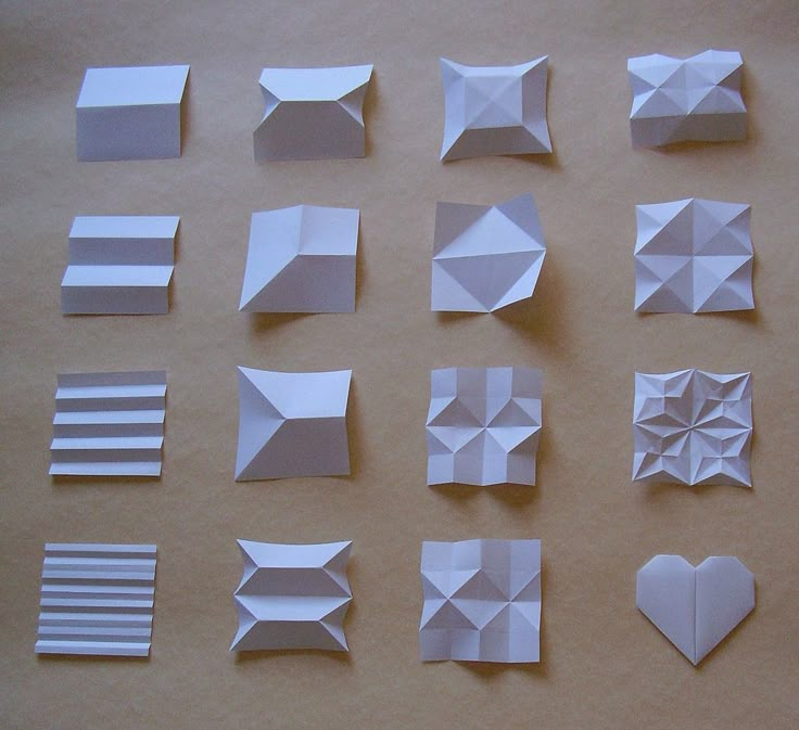 several pieces of paper are arranged on a table