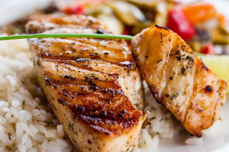 grilled pork chops with rice and vegetables