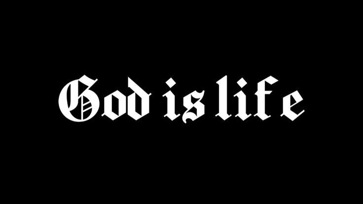 the word god is life written in black and white on a dark background with an inverted font