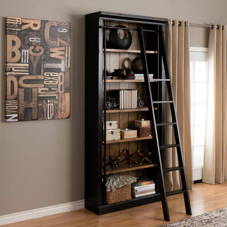 a ladder leaning against a wall next to a book case