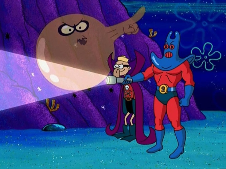 an animated character is standing in front of a giant object with two people on it