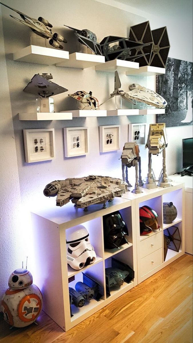 a room with star wars memorabilia on the wall