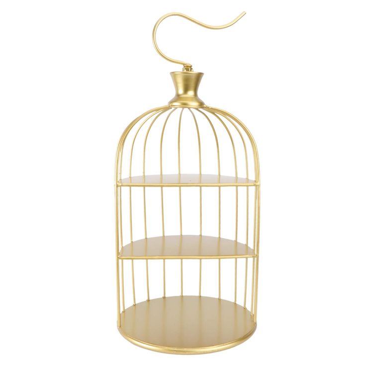 a gold birdcage with two shelves and a hook on the top that is hanging