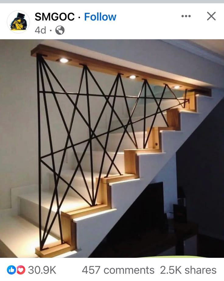 the stairs are made from wood and have metal bars on each handrail, along with led lights