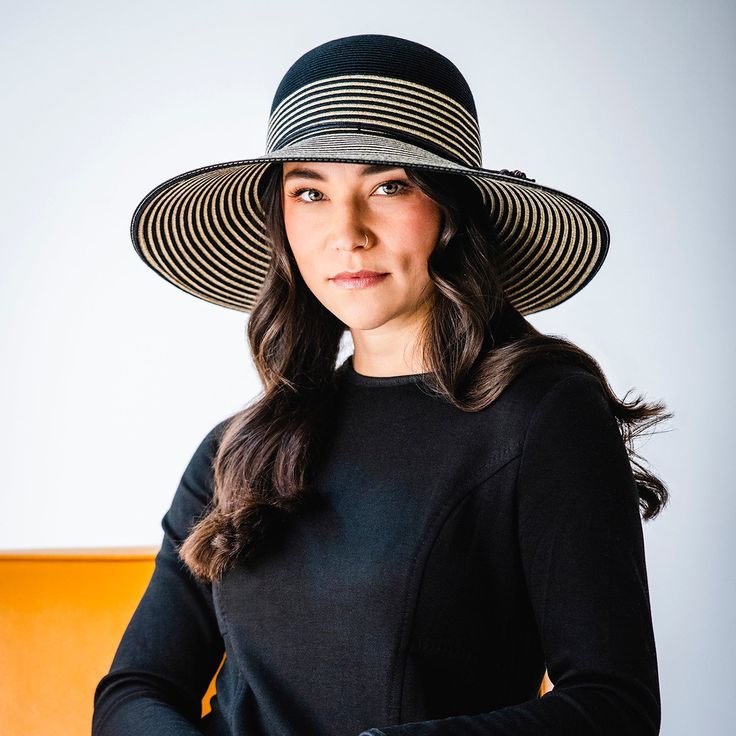 Stripes are always in style. From the beach to the runway, this hat adds a touch of class to any event. Flexi-Weavefabric keeps it looking great. For a petite version of the Marseille, click here. UPF 50+ fabric blocks 97.5% of ultraviolet rays, according to the Australian Radiation Protection Agency 4½" brim Packable: Stuff it Crown size: M (58cm) Inner drawstring adjusts fit 100% polyester exclusive of trim Spot clean only Wallaroo hats do not feature a built-in magnet for emblems. For hats wi Chic Cream Wide Brim Sun Hat, Wallaroo Hats, Hue Leggings, Fabric Blocks, Long Sleeve Swimwear, Wide Brim Sun Hat, Radiation Protection, Fancy Hats, Ultraviolet Rays