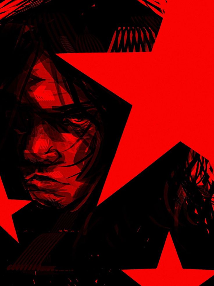 a man's face is surrounded by red and black geometric shapes, including stars