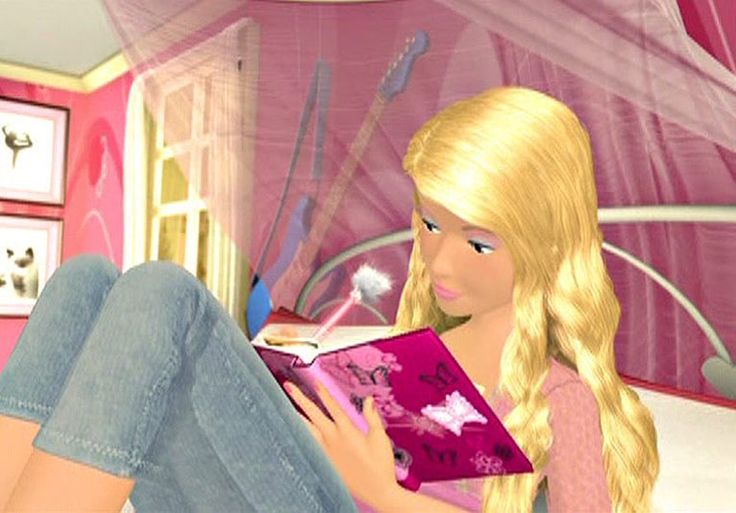 a barbie doll sitting on a bed reading a book