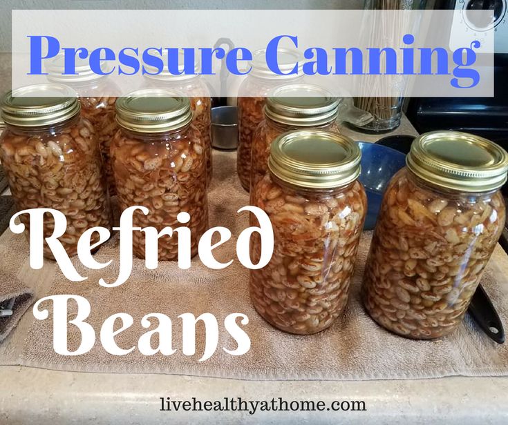 some jars filled with food sitting on top of a counter