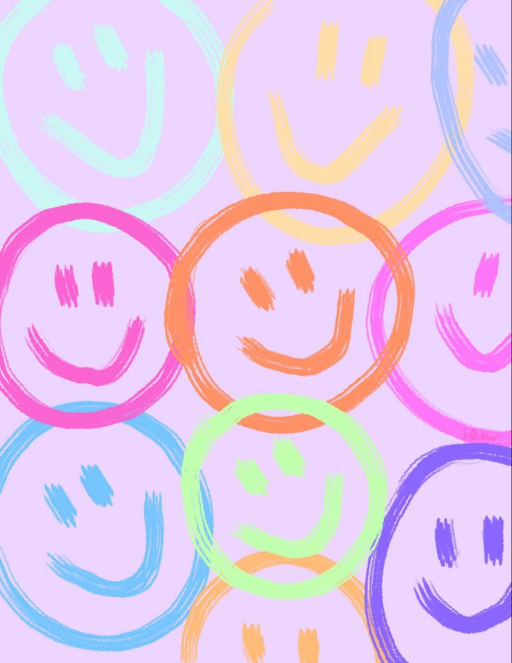 a group of smiley faces drawn in different colors