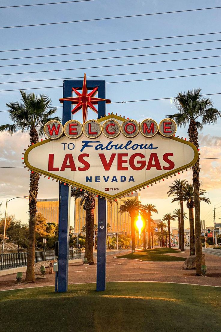 the welcome to fabulous las vegas sign at sunset