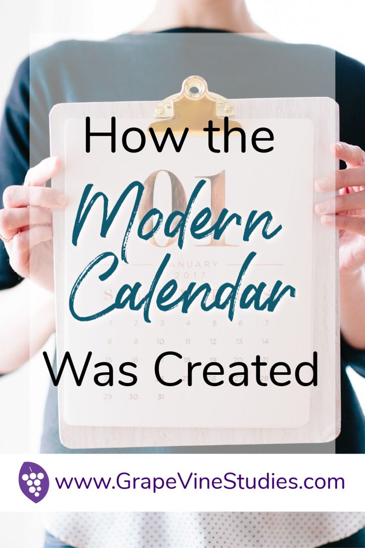 a woman holding up a calendar with the words how the modern calendar was created