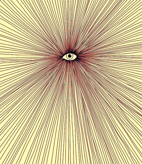 an eye is shown in the center of a ray of light