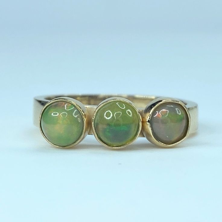 Ornate 14k Yellow Gold Stackable Statement Ring. It Has Three Round Natural Opal Cabochon Bezels, Approx. 4.5-5.0m. Weight 3.9 Grams, Size 6.5. Excellent Vintage Condition. Gold Multi-stone Oval Cabochon Ring, Gold Jewelry With Multi-stone Round Band, Multi-stone Opal Ring In 14k Yellow Gold, Yellow Gold 14k Multi-stone Opal Ring, Yellow Gold Multi-stone Opal Ring, 14k Yellow Gold Multi-stone Opal Ring, Yellow Gold Multi-stone Round Jewelry, Gold Multi-stone Opal Ring With Oval Cabochon, Yellow Gold Multi-stone Opal Ring For Anniversary