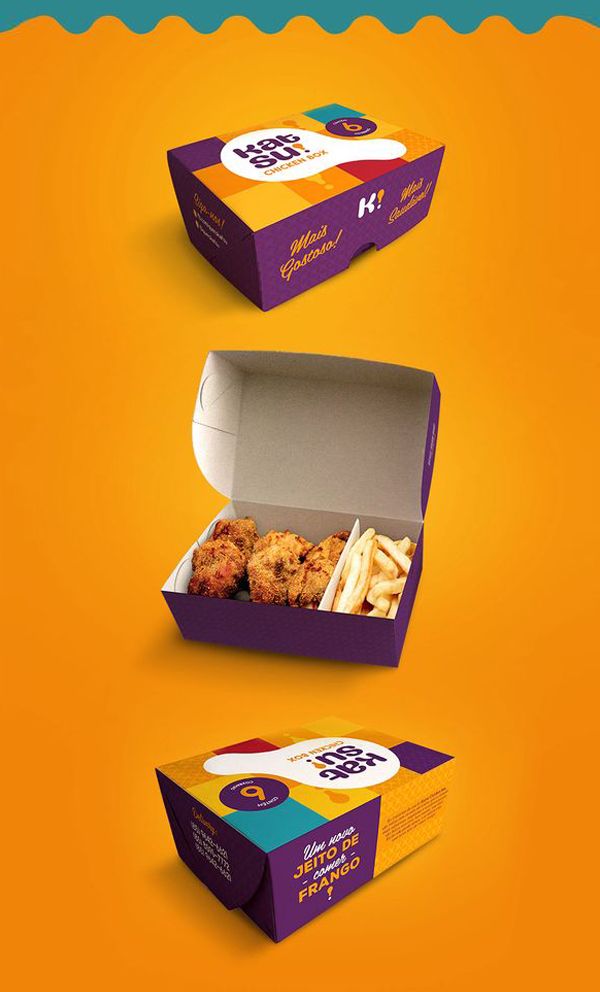 an open box of food with fries on the side and another box in the middle