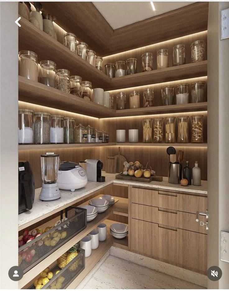 a kitchen filled with lots of wooden shelves and counter top space next to a coffee maker