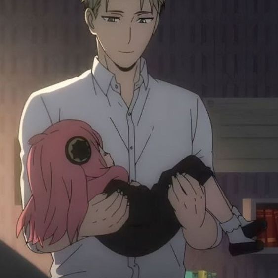 an anime character holding a doll in his hands