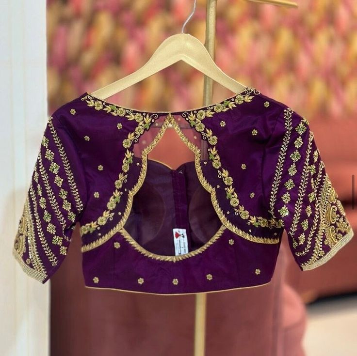 Hand embroidered ready made pure raw silk saree blouse / crop top/stitched saree blouse usa /purple hand saree blouse/ hand embroidered blouse/zardosi blouse/puple heavy bridal saree blouse/ pure silk blouse/ purple wedding heavy maggam work blouse        It is very true that a perfect blouse is the one which makes your saree look stand out !! If you find one of such a style that you have been wanting to have then dont let it go !! we carry such unique trending blouses that instantly add a styli Luxury Purple Embroidered Blouse Piece, Trending Saree Blouse Designs, Purple Blouse Designs, Zardosi Blouse, Hand Embroidery Blouse, Ready Made Blouse, Maggam Blouse, Hand Embroidered Blouse, Stitched Saree