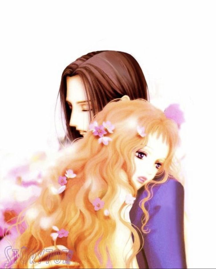 two women with long hair and flowers in their hair