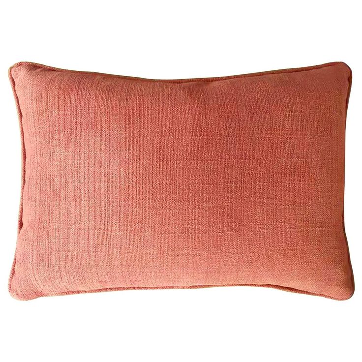 an orange pillow on a white background with a brown border and the bottom part of it is