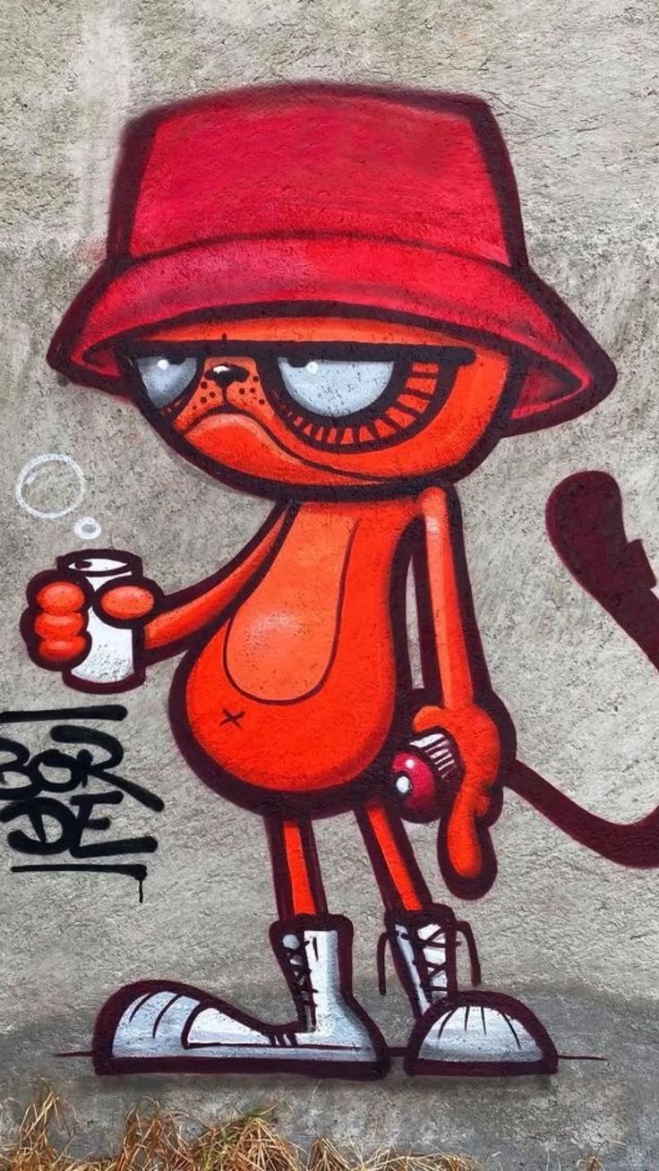 an orange cat wearing a red hat and holding a coffee cup is painted on a concrete wall