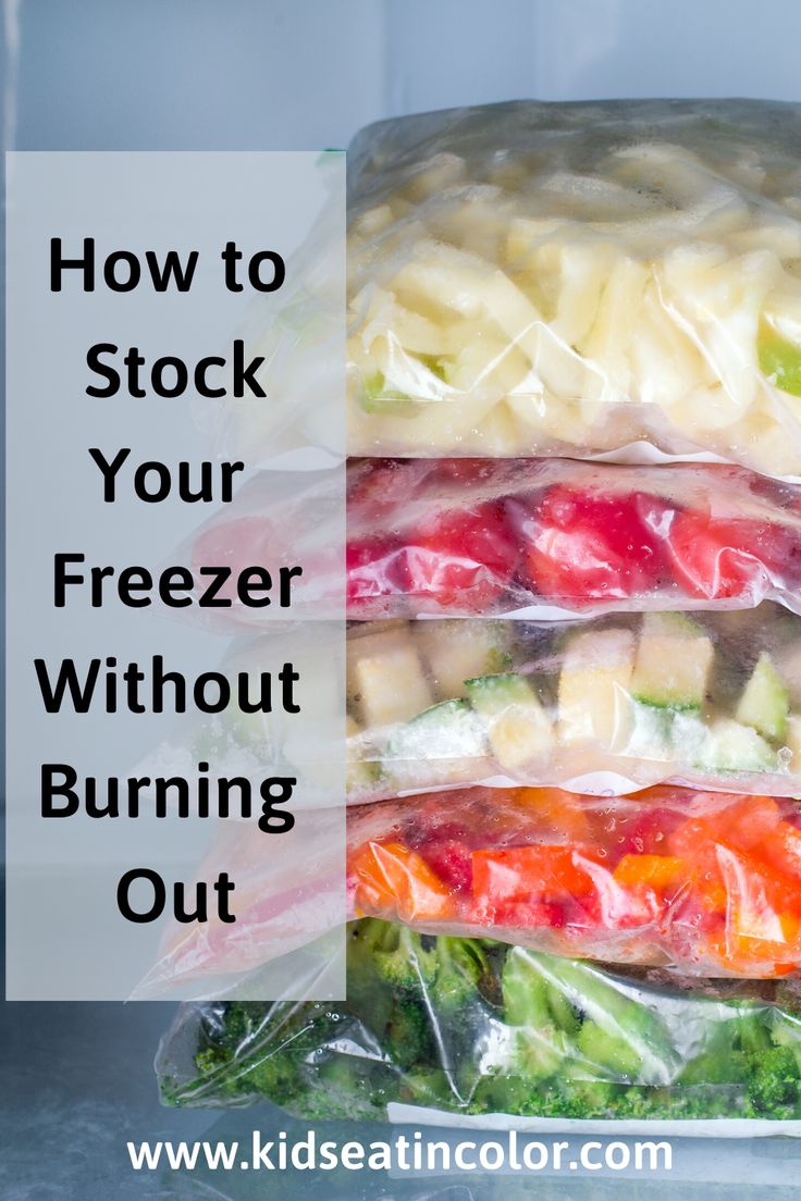 freezer bags filled with fresh fruit and vegetables, text reads how to stock your freezer without burning out