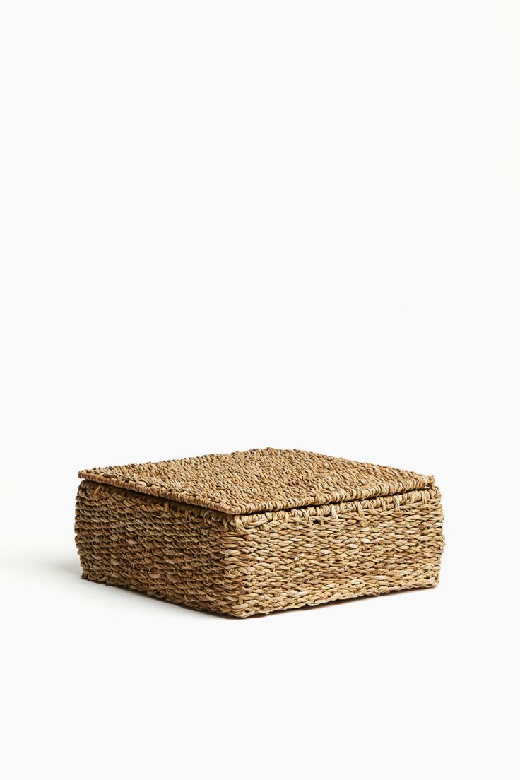 a wicker box on a white background