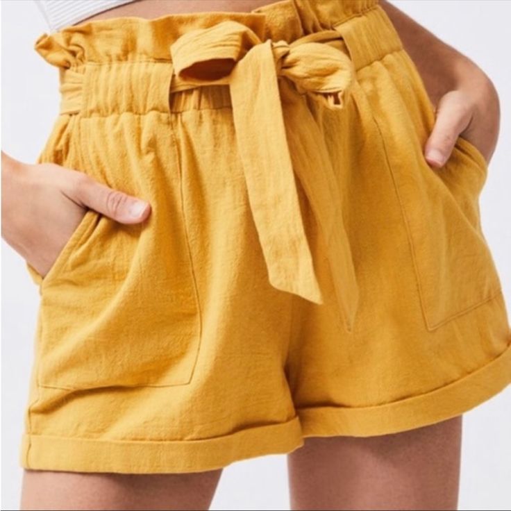 From The Pacsun Brand La Hearts Comes These Cute Paperbag Waist Utility Shorts In A Rich Mustard Yellow Color - Perfect For Spring/Summer Vacation! They Feature Cuffed Legs, A Paperbag Cinched High Waist, A Fabric Tie Belt In Front, And Two Front Pockets. The Fabric Is A Vintage Style Cotton That Is Very Comfy/Breezy. Will Instantly Brighten Any Look! Size: L Material: 100% Cotton Condition: New With Tag Cheap Mustard Crop Top For Spring, Affordable Yellow Bottoms With Elastic Waistband, Yellow Shorts Outfit, Athletic Summer Outfits, Summer Outfits Athletic, Sisterhood Round, Alt Summer Outfits, Vintage Summer Outfits, Summer Outfits Y2k