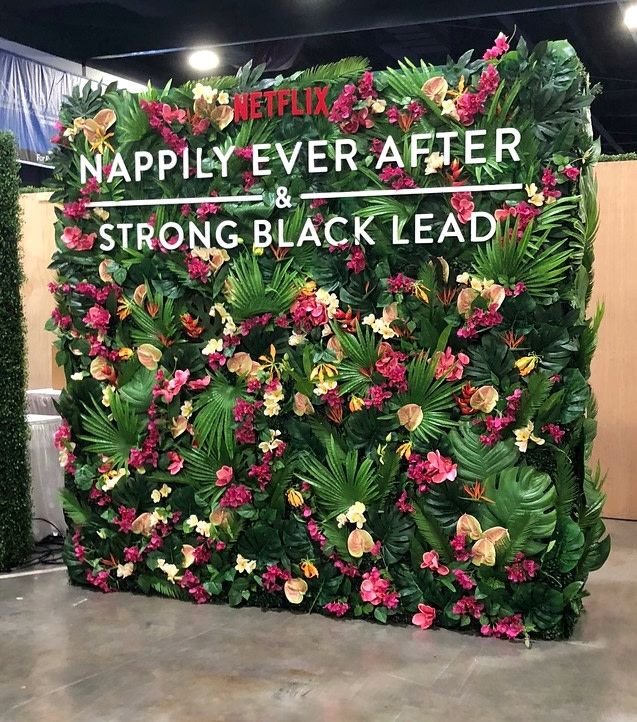 a sign that says happily ever after strong black lead on the side of a wall