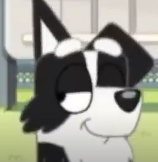 a cartoon dog with black and white spots on it's face, standing in front of a building