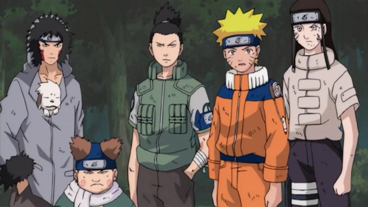 the naruto family is standing in front of some trees and one has his head turned to the side