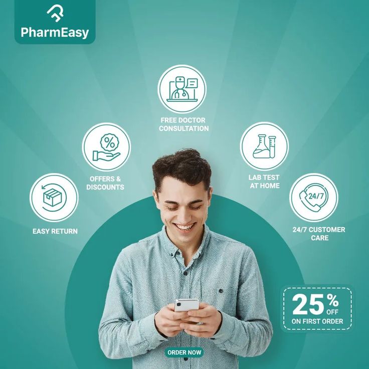 a man looking at his cell phone with the words pharmeasy on it