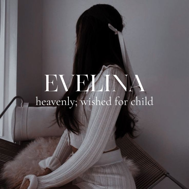 a woman sitting on top of a chair next to a window with the words evelyna written above her