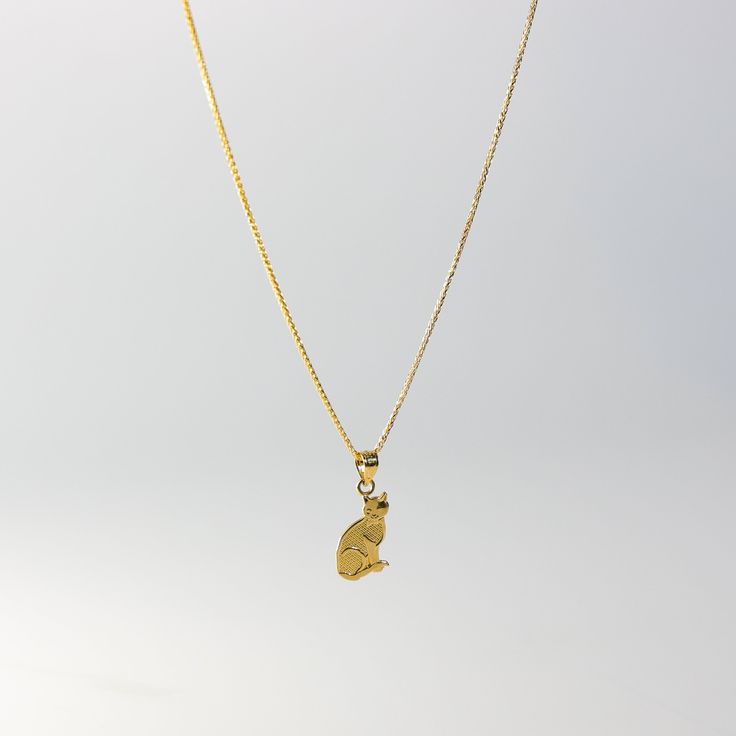 *The pendant COMES WITH the chain if you select one of our chain options *5% OFF TOTAL PRICE, when you purchase the chain and pendant combo (The price shown is after the discount) With purrs so soft and eyes so bright, cats bring joy to day and night. This 14K real solid gold Cat Pendant depicts a beautiful and eye-catching charming gold cat wearing a dainty bow. This gold feline charm is perfect for wearing on a necklace, making it a standout piece that is sure to get noticed. The exquisite cra Cat Necklace Gold, Cat Charm Necklace, Cat Pendant Necklace, Cat Pendant, Golden Jewelry, Bow Necklace, Necklace Making, Cat Charm, Cat Pendants