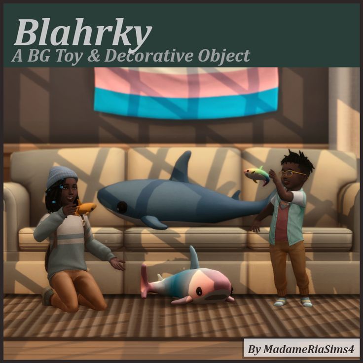 two children are playing with an object in front of a dolphin and another kid is lying on the floor