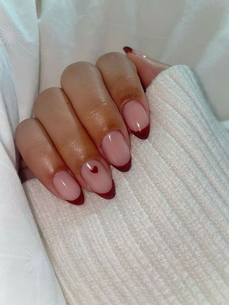 Christmas Nails Heart, Nail Inspo Red Almond, Simple Winter Nails French Tips, Red French Nails With Heart, Red Detailed Nails, Almond Nails Cherry Red, Heart Gel Nail Designs, Cherry Red French Tip Nails Almond, Cherry Red French Tips