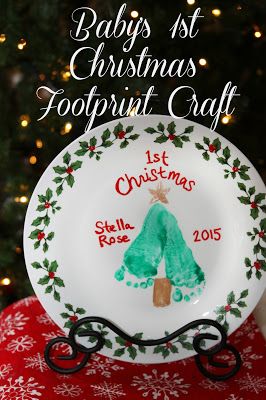 a white plate with a green christmas tree on it and the words baby's 1st christmas footpaint craft