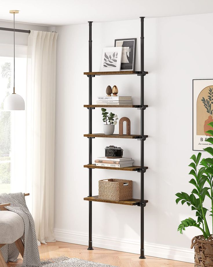 a living room filled with furniture and a plant on top of a wooden shelf next to a window