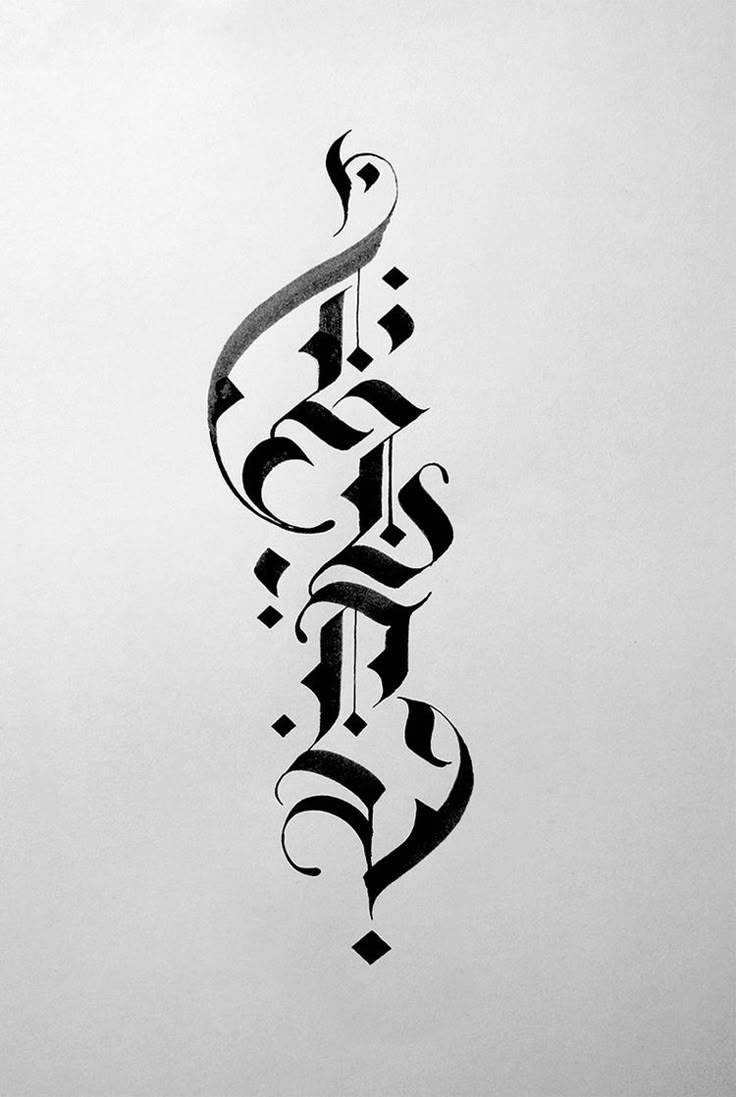 a black and white photo with some type of calligraphy