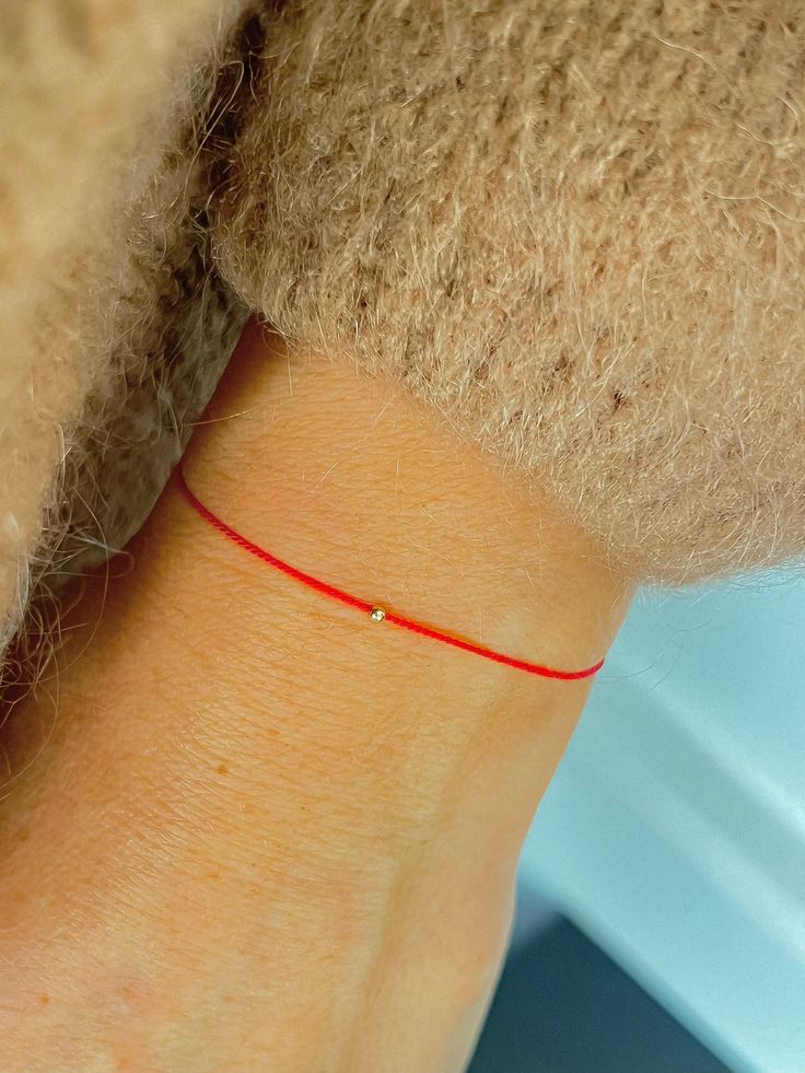 This red string bracelet is made from silk cord and solid 14K gold, 2 mm bead. Wish bracelet is a beautiful way to give someone you care for a wish. All they have to do is make a wish and then tie the cord around their wrist. When the cord finally wears down and breaks the wish is released and will come true - so they say! Details: * 14K solid gold in front, bead in the middle and 2 beads on the tassel is made from gold vermeil. Waterproof Silk String * Adjustable clasp stainless steel metal. 🎁 Cheap Customized Red Friendship Bracelets, Red Cord Bracelet, String Of Fate, Red String Of Fate, Tom Y Jerry, Silk Bracelet, Good Luck Bracelet, Red Bracelet, Bracelets Handmade Diy